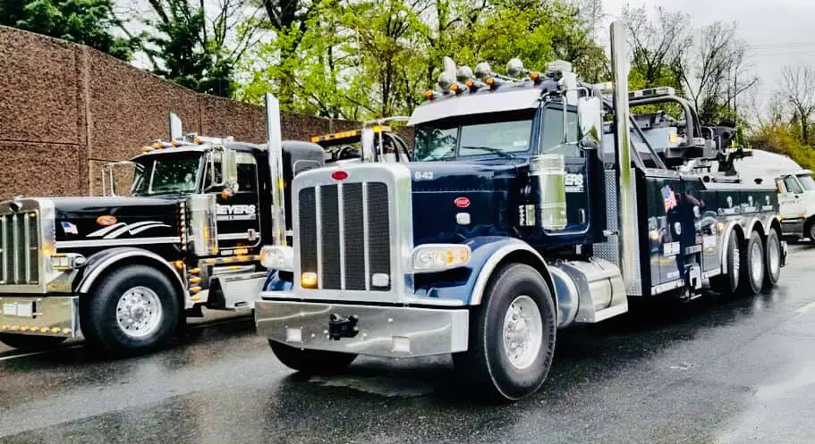 Towing Frederick MD | 24/7 Tow Truck & Roadside Help 3 Two Geyers heavy towing trucks on the road