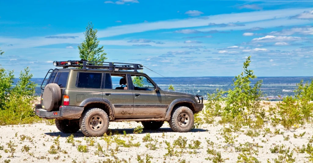 AWD SUV parked on a hilltop